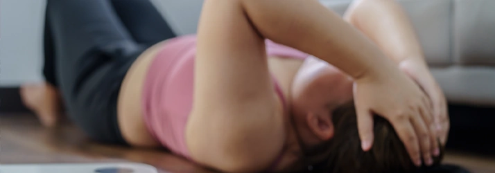 Hands supporting the head